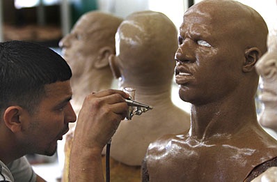 High tech rubber mask of a Blank man being painted