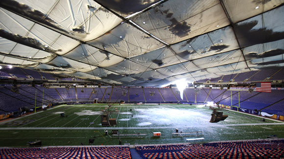 Snow storm causes Metrodome Stadium roof to collapse in Minneapolis, Minnesota